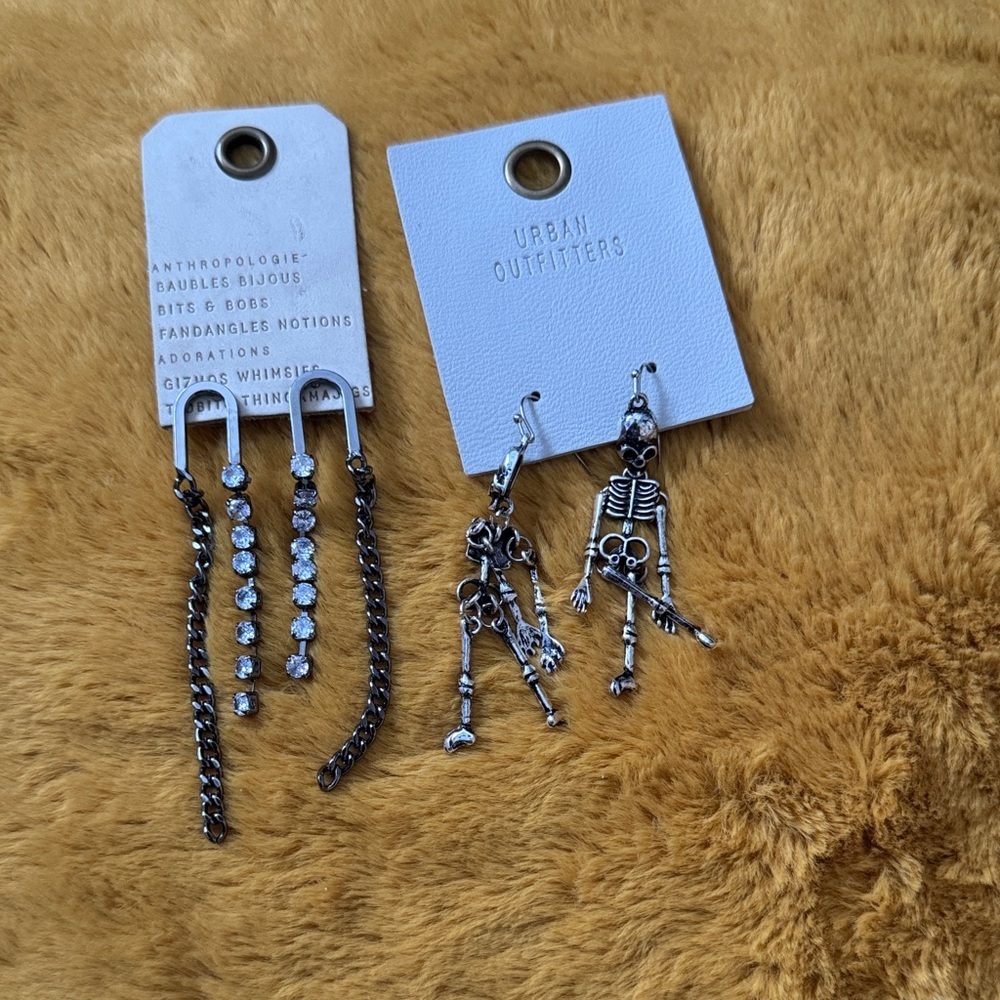 2 for 1: Urban Outfitters Silver Skeleton Earrings and free earring set
